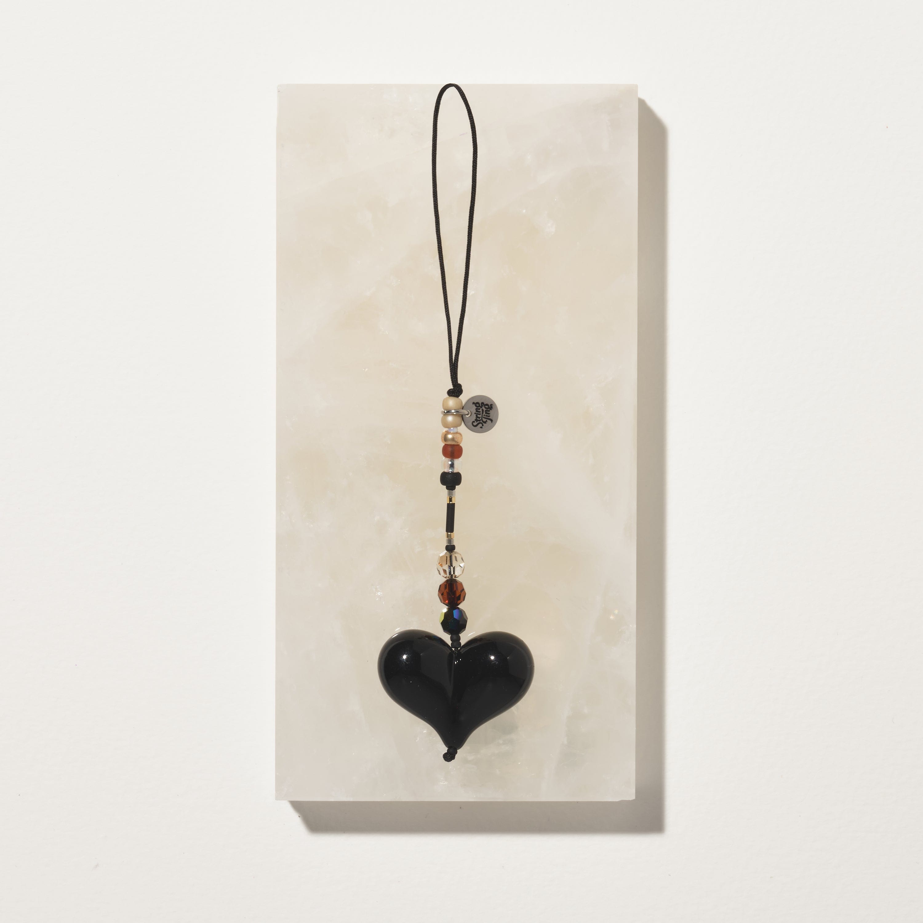 Teeny Bourbon Talisman