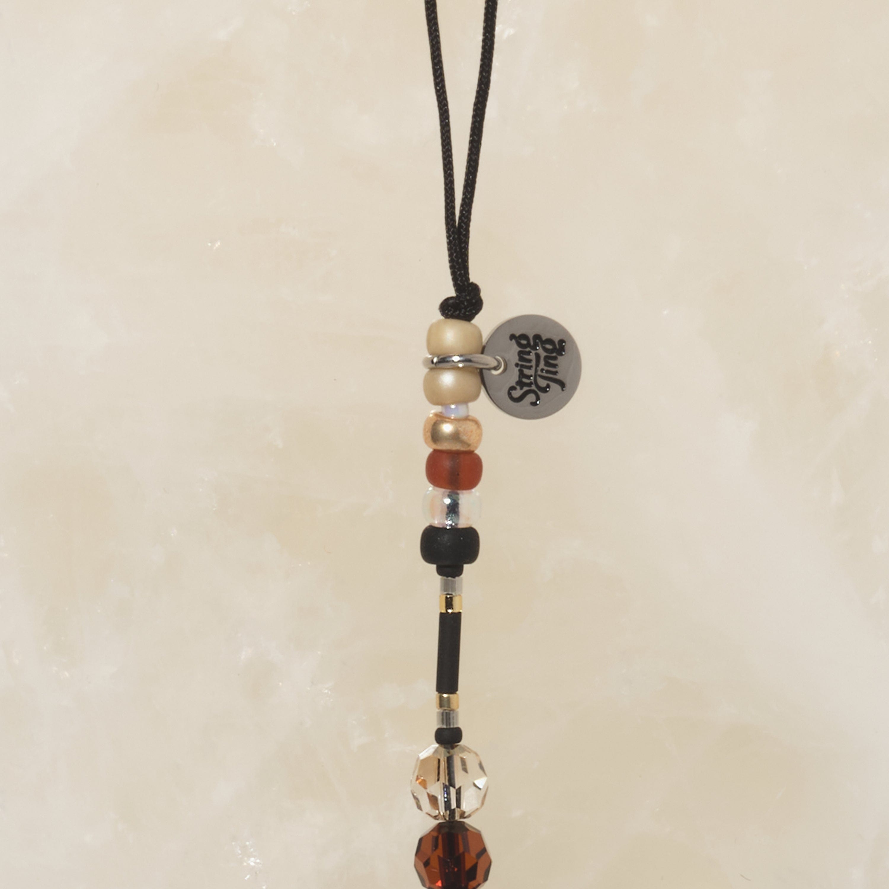 Teeny Bourbon Talisman