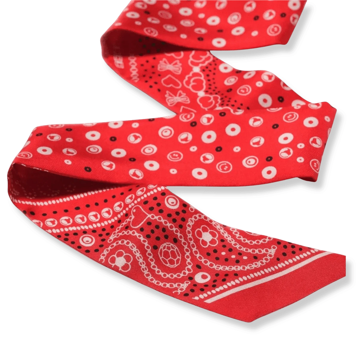 Close-up of the red Bead Parade silk twilly scarf, focusing on the fine silk texture and the hand-drawn bead-inspired design.
