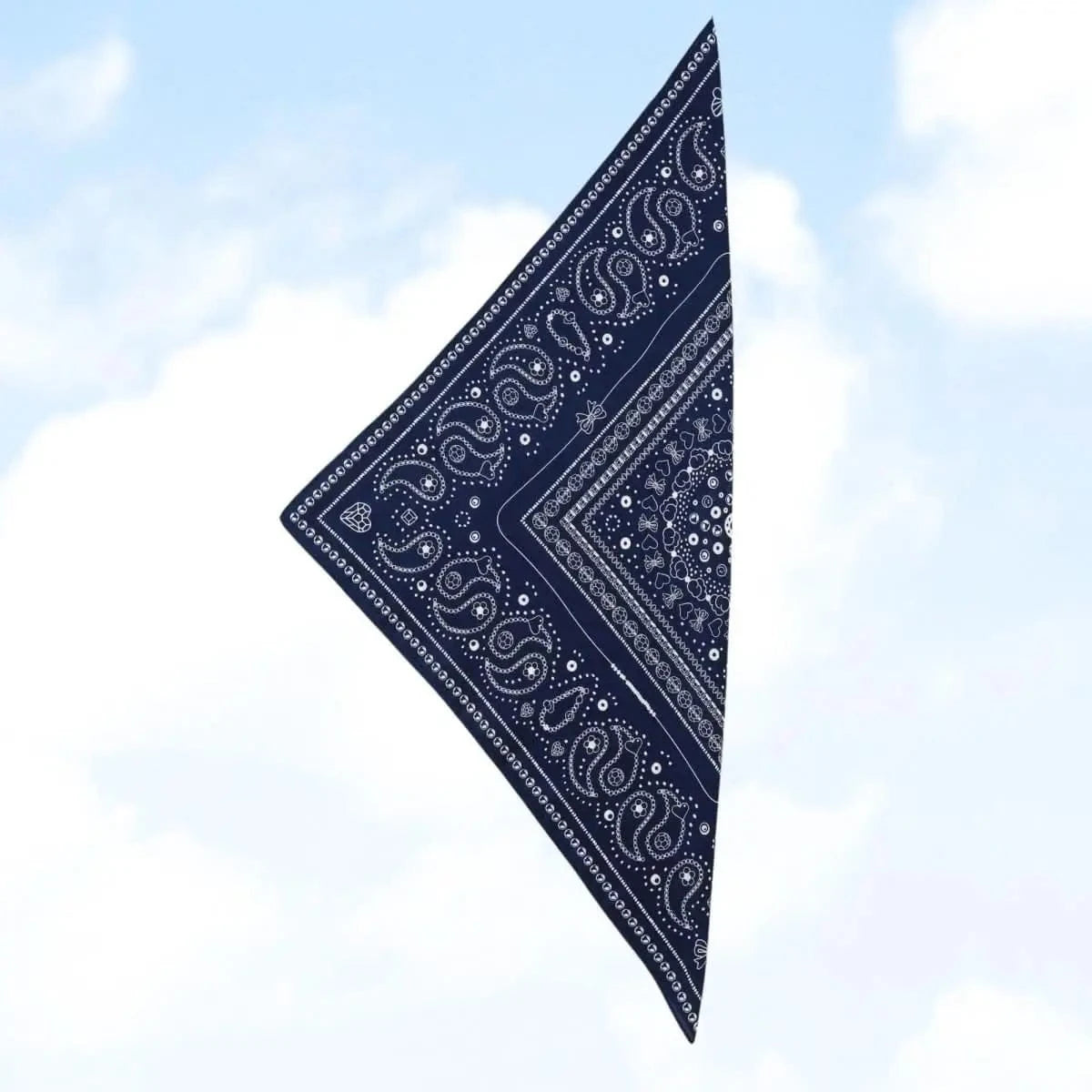 Close-up view of the indigo Bead Parade bandana, highlighting the detailed hand-drawn bead motifs and paisley elements.