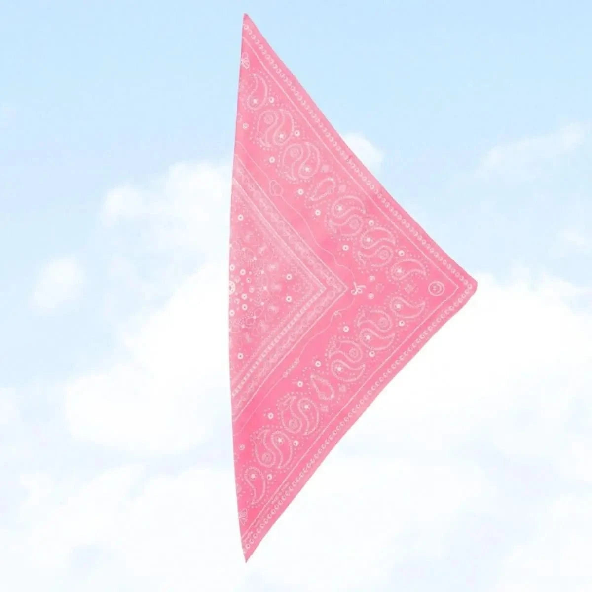 Bead Parade bandana in pink, folded into a triangle shape with visible intricate white bead motifs.