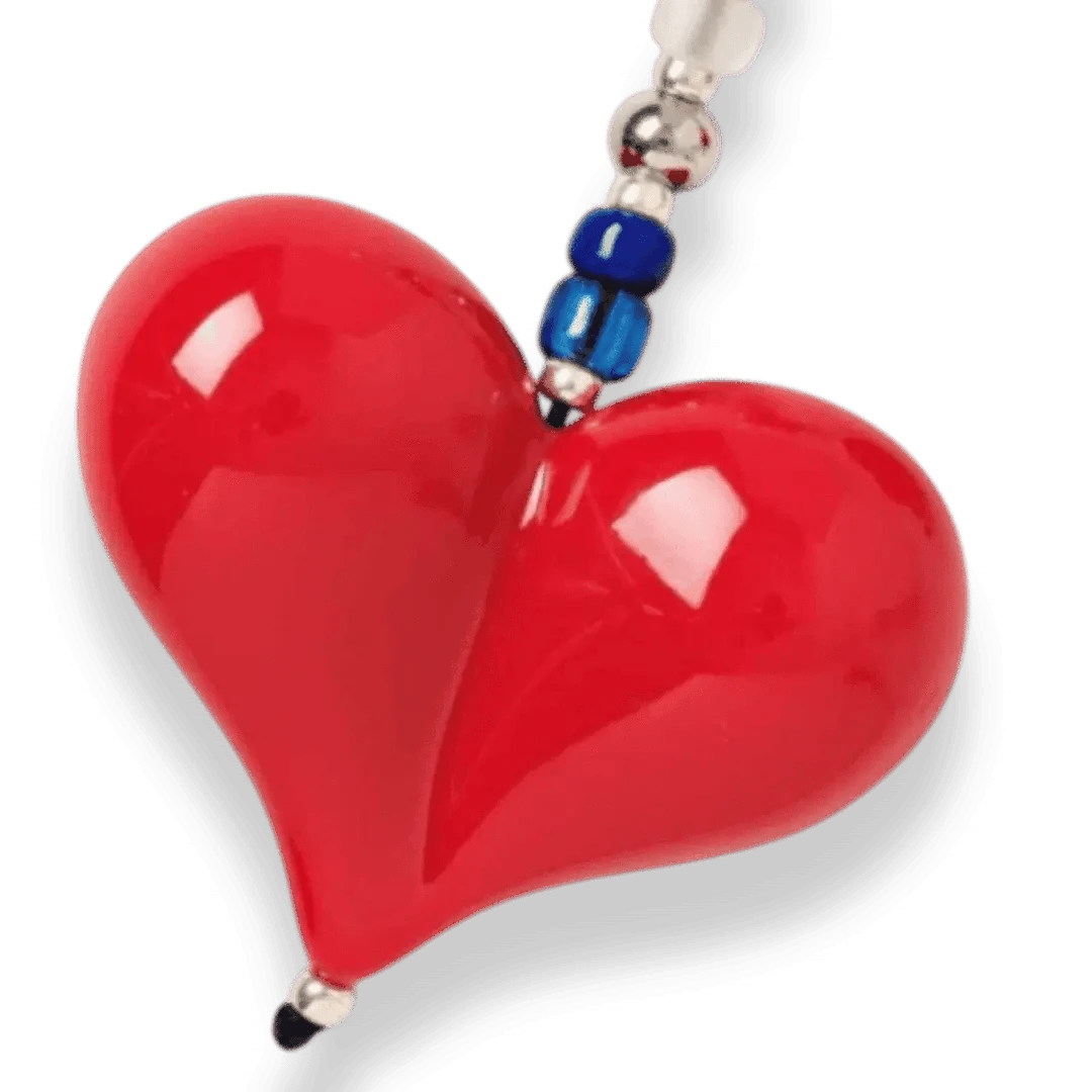 Close-up of the Big Love Shorty Bag Charm, highlighting the intricate beadwork and glossy red resin hearts on the stainless steel chain.