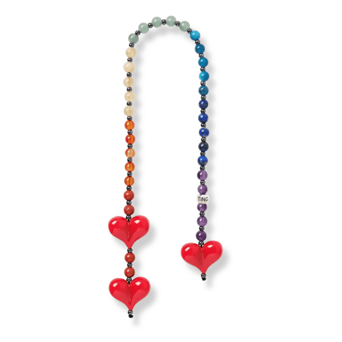 Front-facing image of the Big Chakra Energy Bag Charm by String Ting, showcasing a vibrant, hand-strung design featuring Grade A gemstones representing the seven chakras, including amethyst, lapis lazuli, and red jasper, arranged in a cascading pattern.