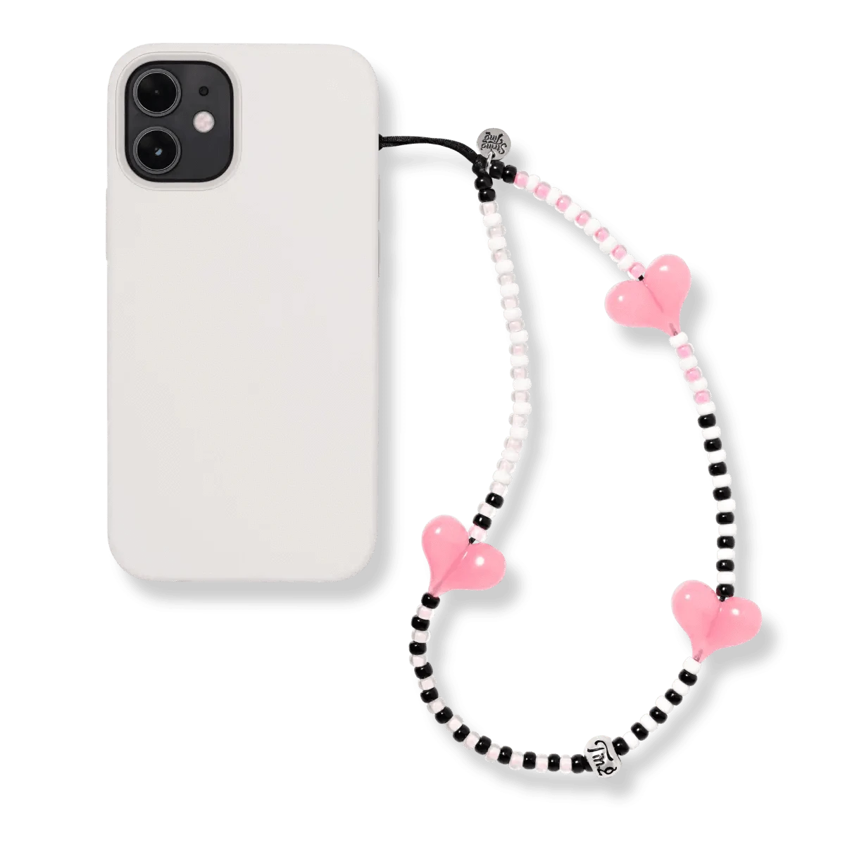 Close-up of a smartphone adorned with the Cherry Bombshell Wristlet Phone Strap, showcasing the strap's colourful beads and hot pink heart accents.