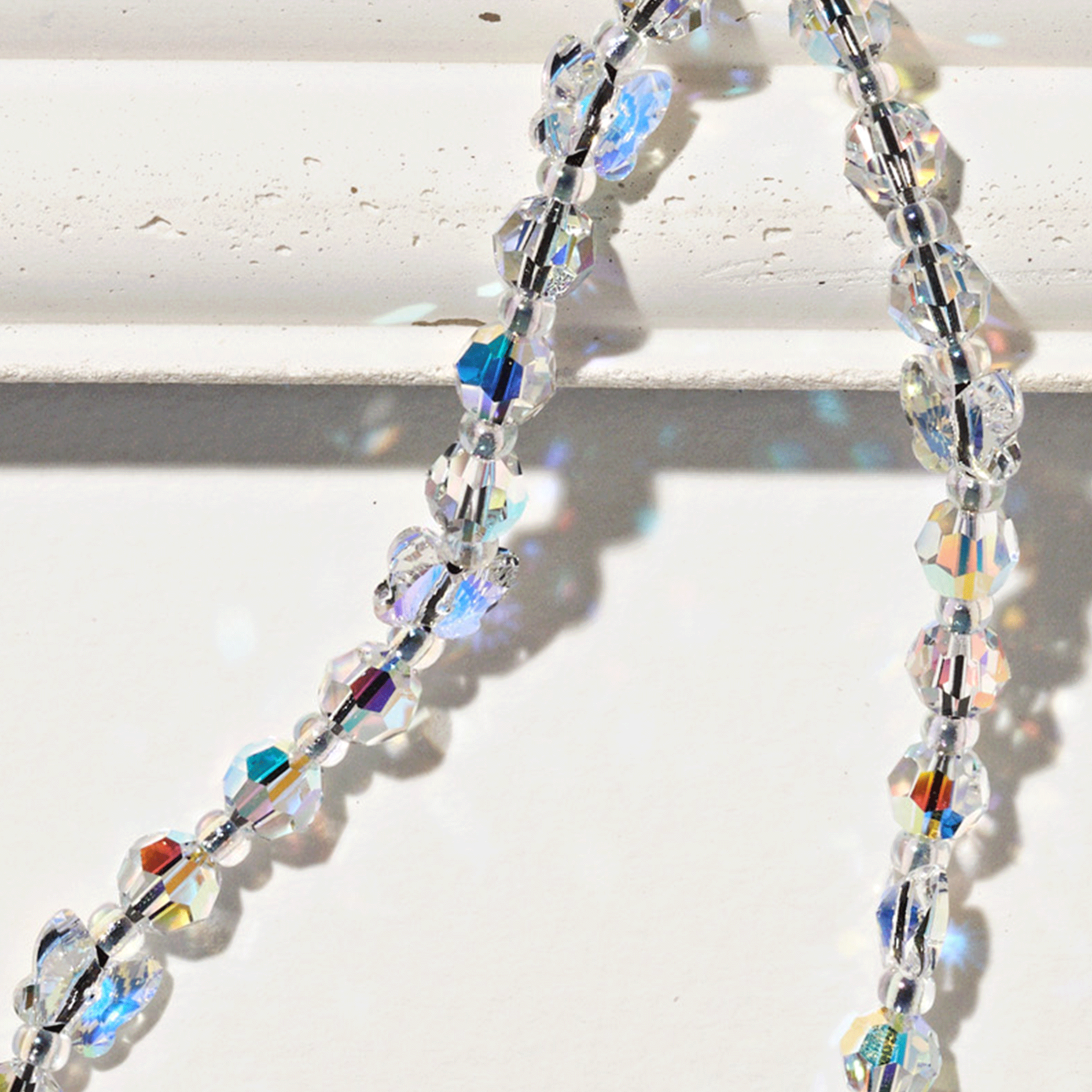 Flutter Drip Crystal Wristlet Phone Strap | String Ting Flutter Drip Crystal Wristlet Phone Strap | String Ting