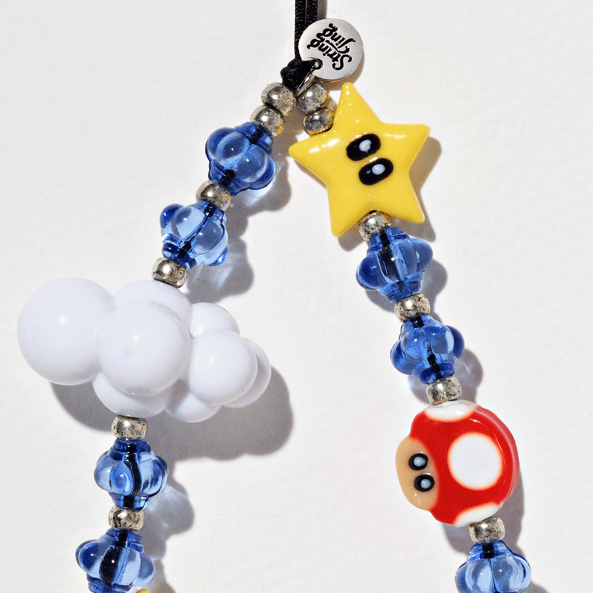 Itsssameeee Wristlet Phone Strap | String Ting® Official Itsssameeee Wristlet Phone Strap | String Ting® Official