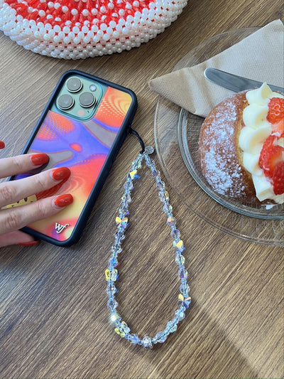String Ting London Flutter Drip Crystal Wristlet Phone Strap